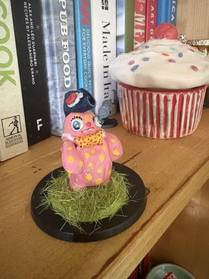 imagine mr blobby in napoleons hat.  yep thats about it