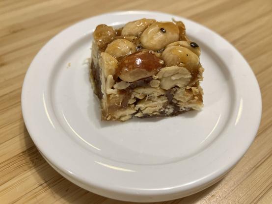 A small candy peanut square.