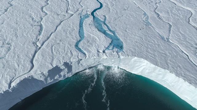 A melting ice shelf in the Arctic showers freshwater into the ocean.