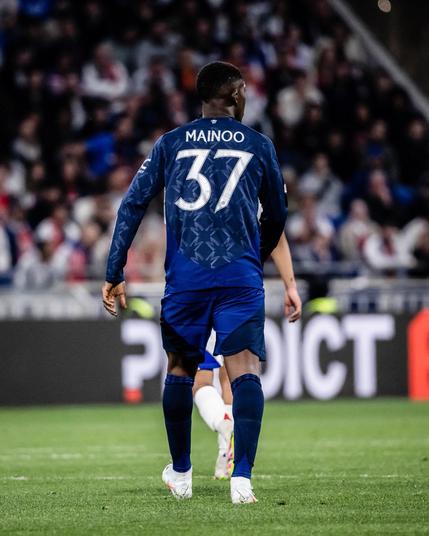 Kobbie Mainoo in action v Lyon.