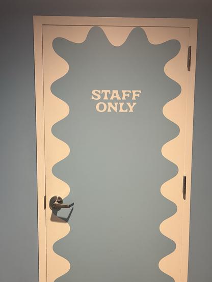 Next to the other 2 doors is this one. It says “Staff only” and has no obvious spelling or grammar problems.