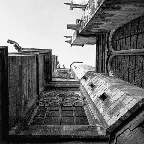 bottom to top view of a corner of the auxerre cathedral, france