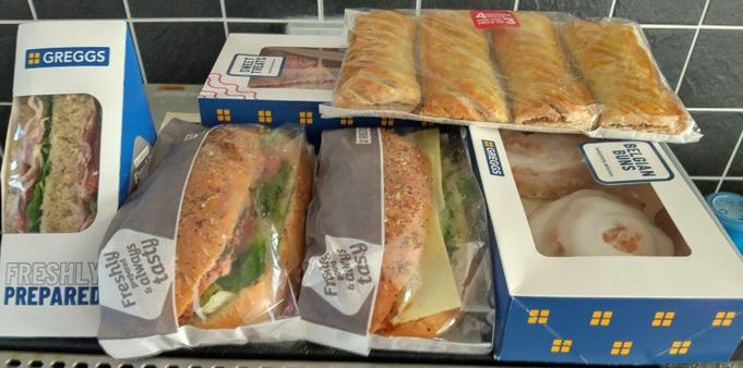 Displaying the contents of my 'Too Good To Bag', collected from my local Greggs this morning - sandwiches, sausage rolls, buns and doughnuts!