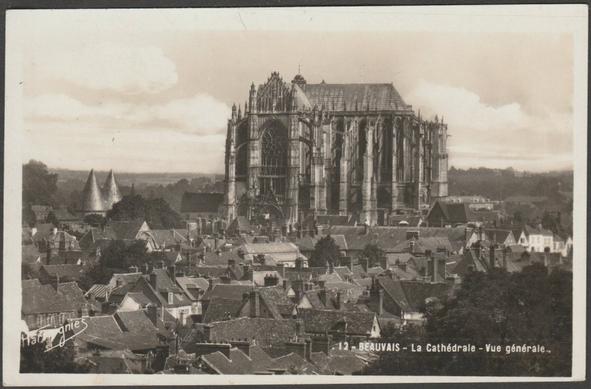 Monochrome real photographic postcard showing a general view of the cathedral and surrounds at Beauvais in Oise, France.

Published by E. Harmignies, Paris, No 12, c.1940.

Postally unused.

Good condition, with very slight corner bumps, but small 7mm tear to centre top edge.