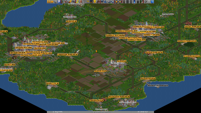 Screenshot of zoomed out map of my OpenTTD session. Lots of train tracks connecting multiple cities and businesses.
