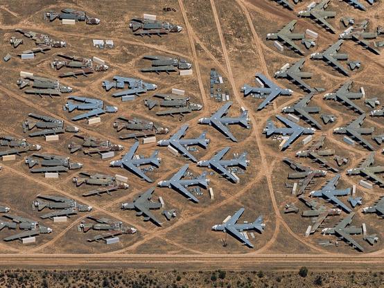 an aerial image of an aircraft junkyard