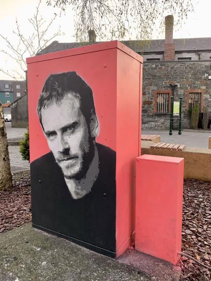 Stencil art portrait of actor Michael Fassbender in Kilarney Ireland by Paul Egan - after