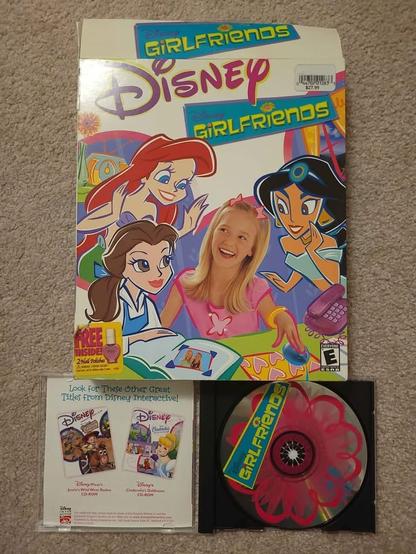 A photo of the Disney Girlfriends PC big box software, showing several disney characters and a preteen girl.