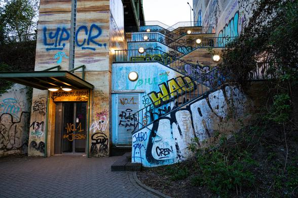 Stairs with graffiti.