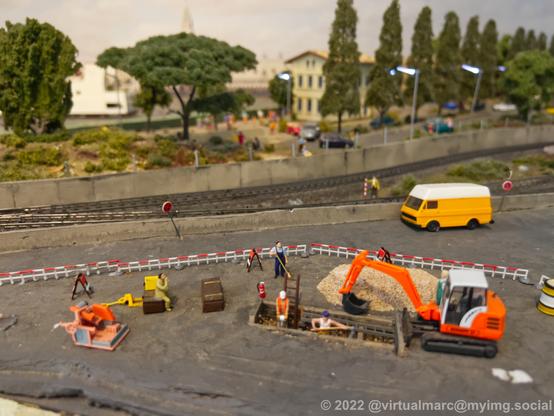 A photo of roadworks on a model railway.