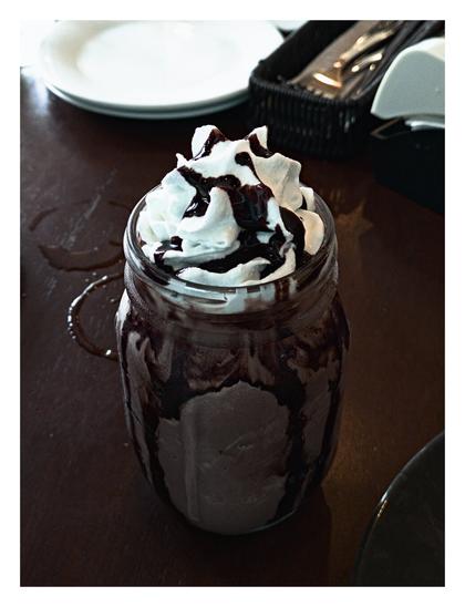A chocolate chip milkshake.