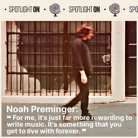 A photo of Noah Preminger walking down a city street.