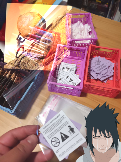 Photos of my table with merch in boxes getting labeled