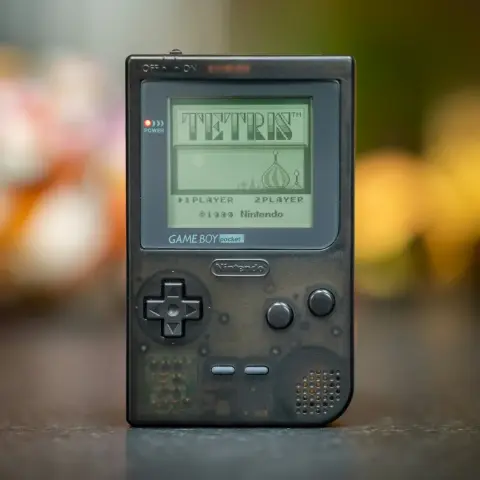 A picture of a monocrhome display gameboy running Tetris.