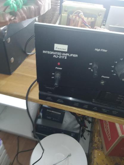 Front of the Sansui AU-217 mk2 
Focused on the left corner with brand name and model above the on and if switch