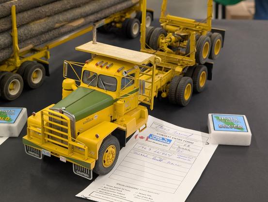 Logging truck pulling an empty trailer