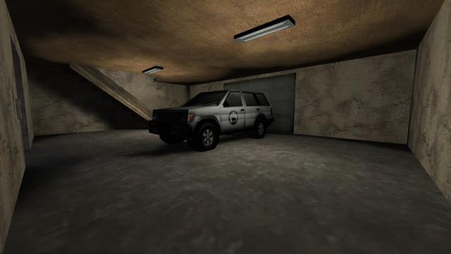 In this picture you can see the inside of the device. Here is a white SUV in the Gerage. A black Black Mesa logo can be seen on the side door. Two flat white illuminated lamps are attached to the ceiling. Furthermore, you can see a staircase that leads upstairs, almost to the attic of the Gerage. On the left side of the wall you can still see a passageway. To the left of it you can see a light switch for the lamps. This is on the map cs_militia in the game Counter-Strike 1.6.