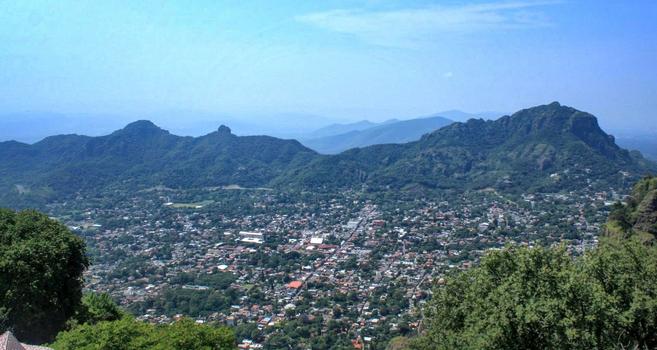 a landscape photo taken from the heights of a small village in the middle of the hills (Tepoztlán, Mex).