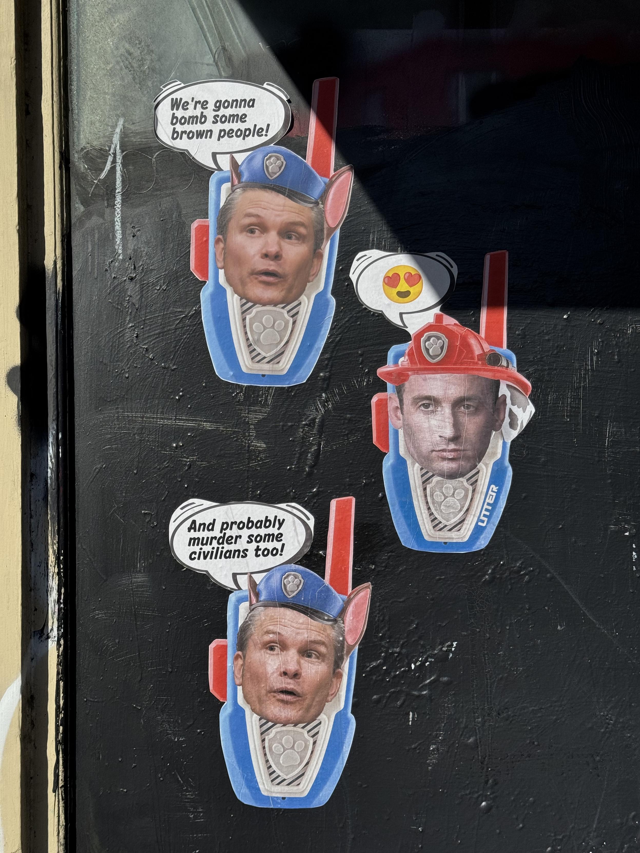 Collage art wheatpasted on a wall by a graffiti artist. The art shows the heads of Pete Hegsworth and Stephen Miller having a conversation as if they are texting each other on a Signal chat group. Pete Hegsworth texts "We're gonna bomb some brown people" to which Stephen Miller replies with a 😍 emoji, then Pete texts "and probably murder some civlians too." The art is a reference to a leaked chat involving several of Trump's top cabinet members, and the editor of the Atlantic.