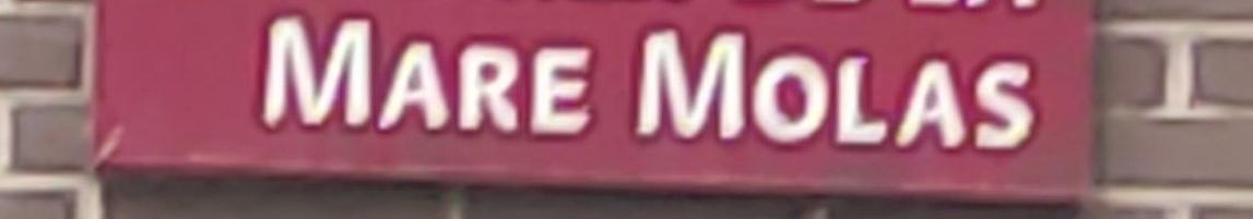 Cartel del nombre de una calle que pone mare molas