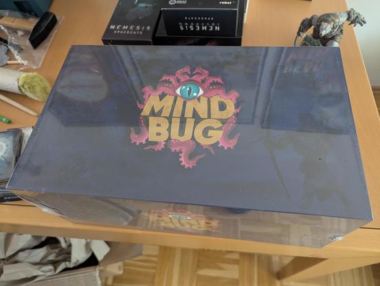 Unopened Mindbug box on a table
