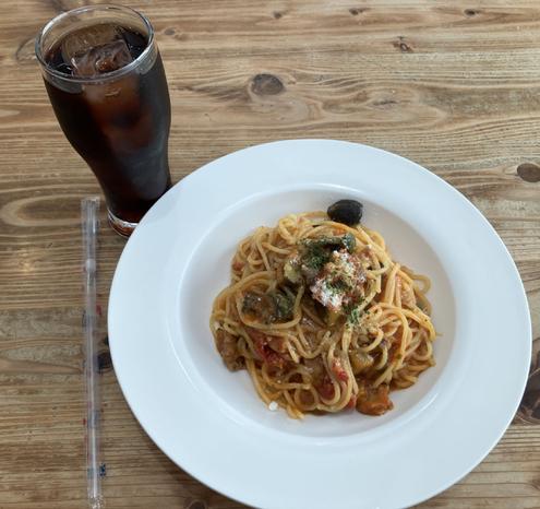 Had tomato and olive pasta and a glass of coffee at an Italian cafe on my way back.