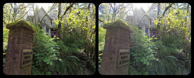 Brick pillar with brass placque reading "Haunted House -- 4 Tickets."