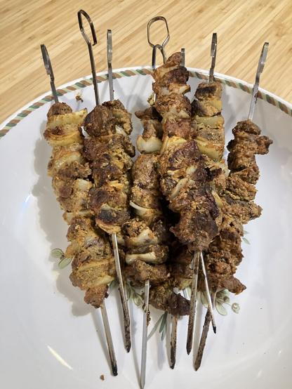 Eight BBQ’d beef skewers.