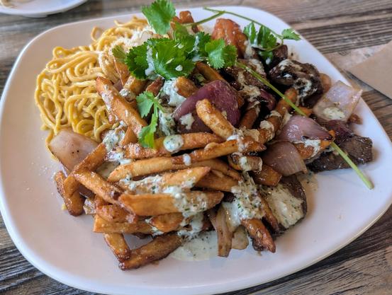 Vietnamese style Peruvian Lomo Saltado with shaken beef and garlic noodles from Fusion Corner in Stanton