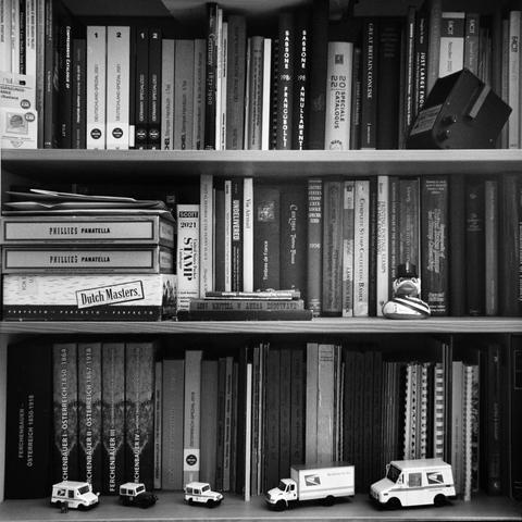 A philatelic library - various books about stamps and related history, and other postal ephemera