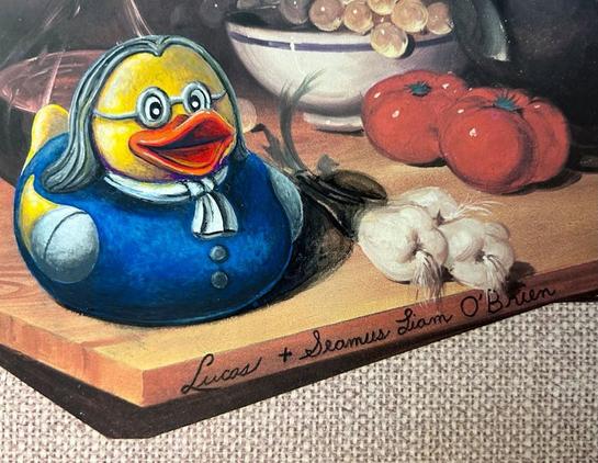 Sobre still live painting of a chopping board with vegetables and a bowl of grapes on top alterered by the addition of a rubber duck caricatured to look like Benjamin Franklin.