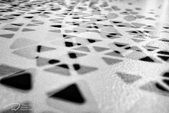 A triangle pattern print on a train table this morning.