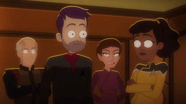 A shot of Alternate Reality T'Pol talking with William Boimler in a holding cell on Khwopa.  Curzon Dax and Alternate Reality Mariner are also in the holding cell, along with Lily Sloane and members of her crew (who are off-camera in front of them).  From E509