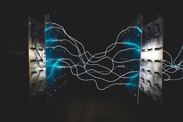 Illustration with electric cables plugged right and left