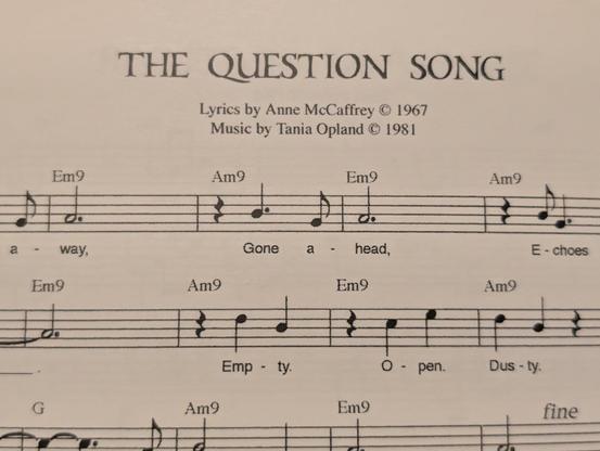 Some sheet music titled “The Question Song”.