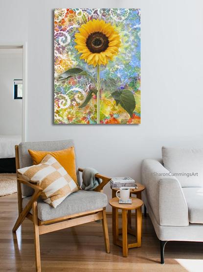 Sunflower and lace in a rainbow of colors in art on a wall in a furniture setting by artist Sharon Cummings. Haiku in post.