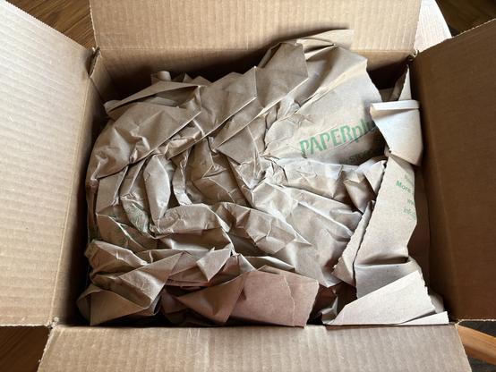 The box is open and reveals…packing paper! How exciting! (not so much)