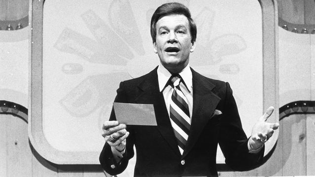 Black-and-white photo of wink on his show tick Tac doe
