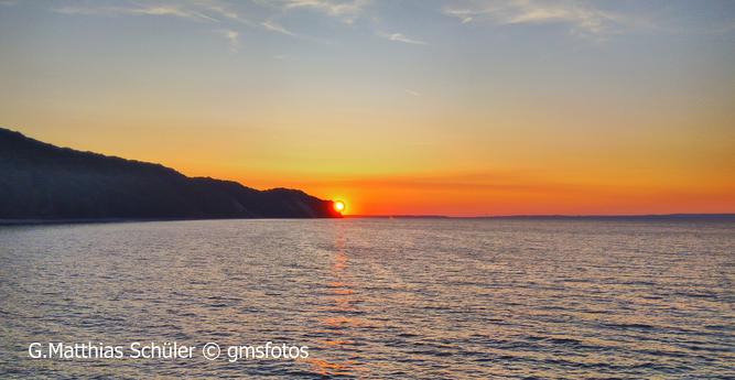 Sonneuntergang auf Rügen , auf der  Seebrücke in Sellin