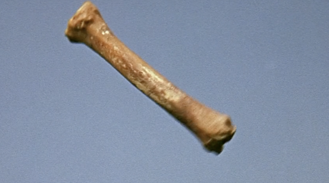 A bone used as a weapon thrown up in the air by early humans