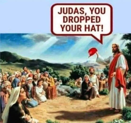 Artist's depiction of Jesus' Sermon on the Mount:

Jesus holding a red hat with tiny white letters.
"Judas, you dropped your hat!"