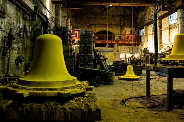 The casting hall.  Green bell moulds in preparation.