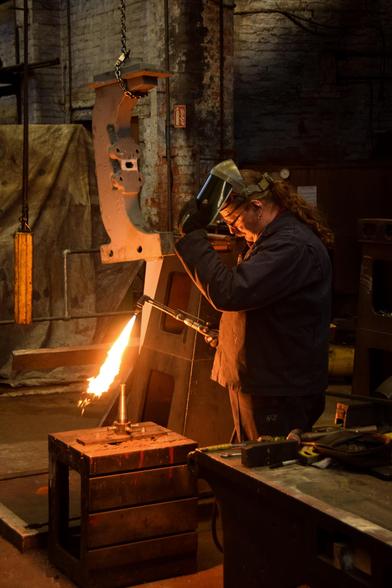 A man with a blow torch.