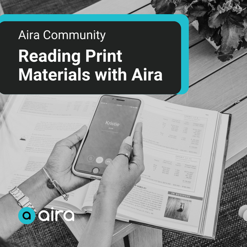 A person holds a phone showing an incoming call from “Kristie” over an open book with charts and text. The image reads, “Aira Community – Reading Print Materials with Aira.” Aira’s logo appears at the bottom.