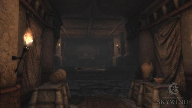 Image of the interior of Andavel Ancestral Tomb, showing a torch-lit corridor with various urns placed on altars and tapestries hanging on the walls.