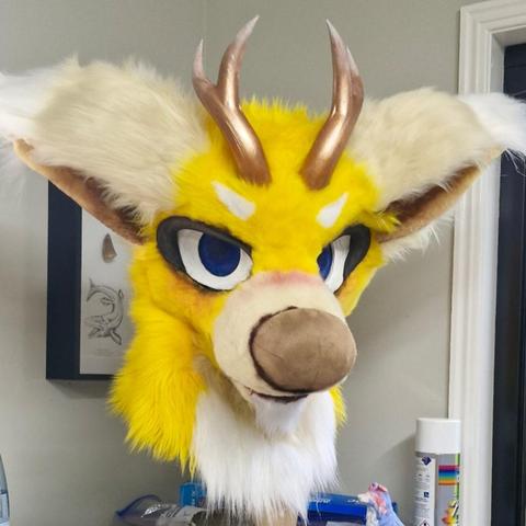 Dog dragon with gold horns