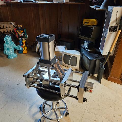 the completed vise build atop a rolling stool because that dang vise is heavy af for real