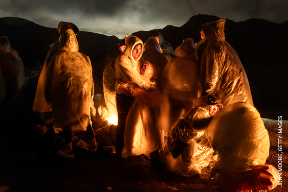 Una de les fotografies finalistes mostra les dures condicions dels migrants que volen entrar als Estats Units (John Moore, Getty Images)