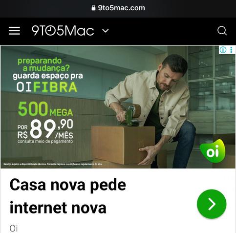 An ad on 9toMac shows a man with a moving box and offers 500M internet fiber