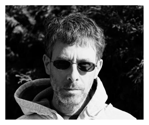 Black and white self-portrait.